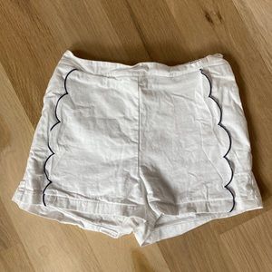 Girls white shorts with navy scallop